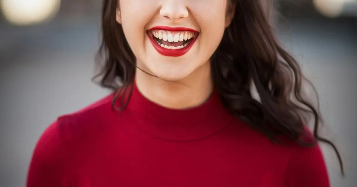 Woman taking confident dating profile photos for Badoo
