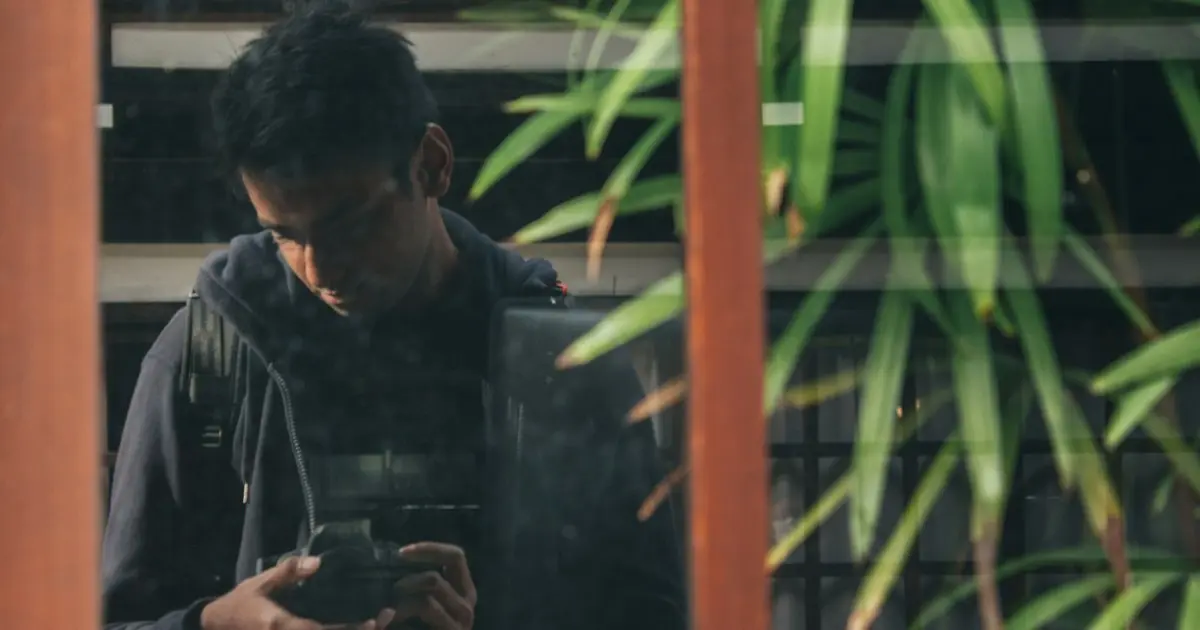 Person writing smartphone dating profile