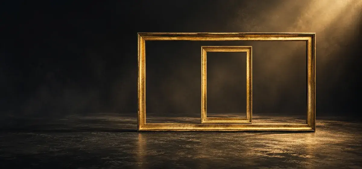 A wide empty gold frame containing a vertical frame representing different photo crops