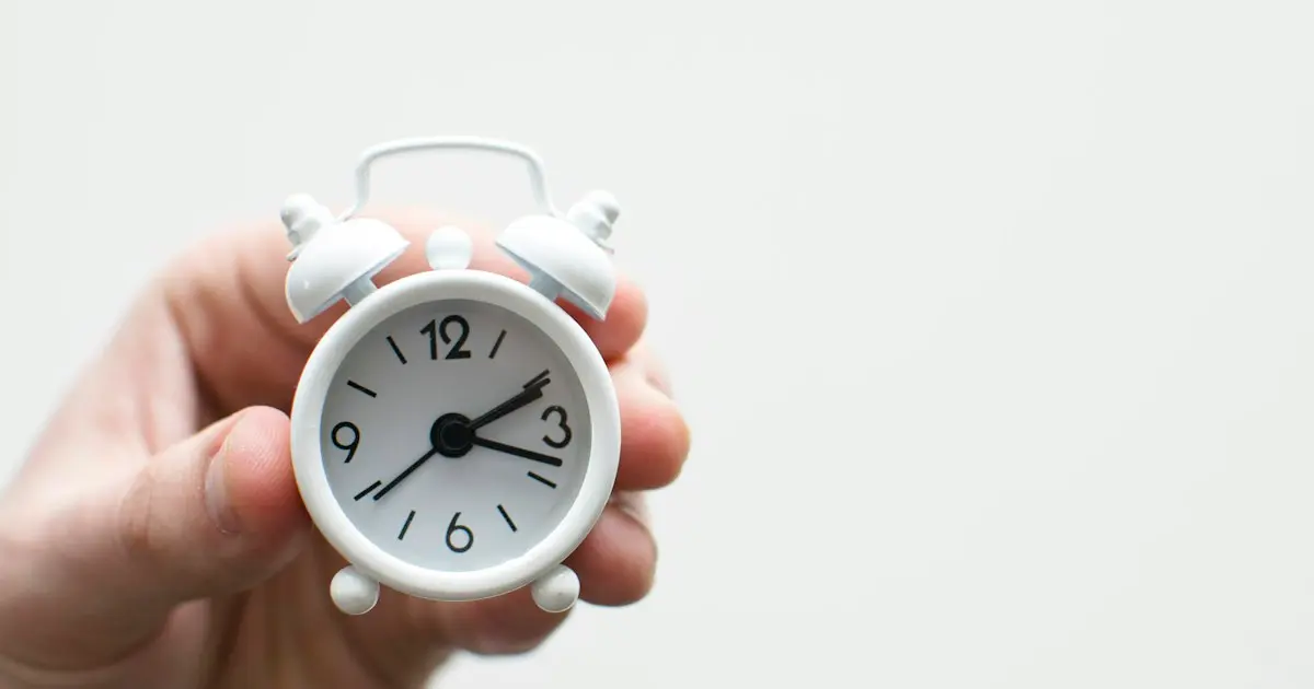 Hourglass with phone showing pending dating app application
