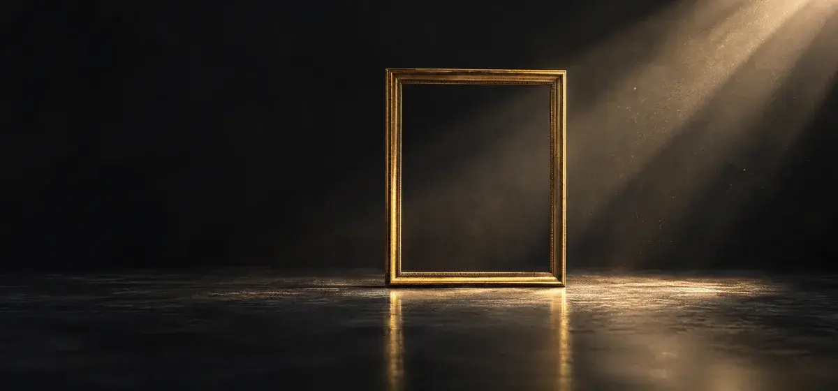 A single warm gold key light raking across an empty dark picture frame, representing how an image model renders light on a face